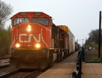 A westbound runs around a stopped train